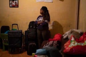 Irene waits in her house for the judicial committee to evict her with her things packed
