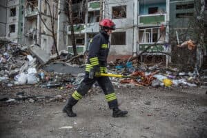A fireman works in the destroyed village of Chernihiv, Ukraine.